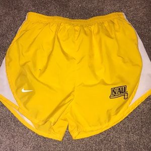 yellow NAU nike running shorts